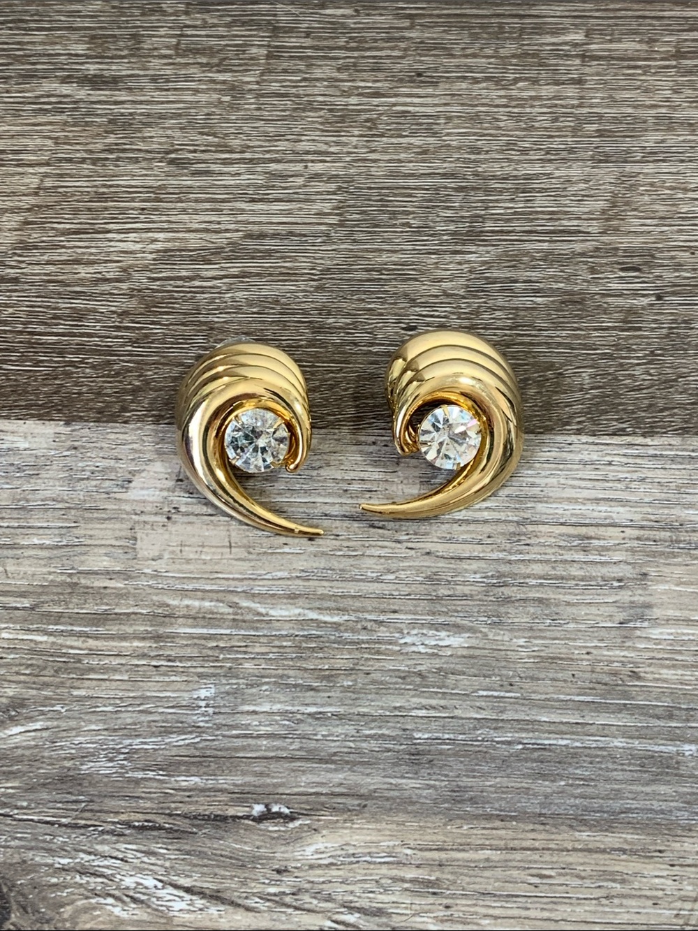 Gold-Tone Swirl Stud Earrings with Clear Crystal Accent